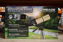 A boxed as new Meade Adventure Scope refracting telescope