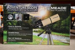 A boxed as new Meade Adventure Scope refracting telescope