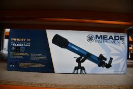 A boxed as new Meade Infinity 70 telescope