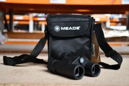 An as new Meade travel view 8 x 25 binoculars (Unboxed)