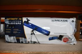 A boxed Meade Polaris 130 reflector telescope (Box unsealed)