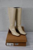 A pair of Alohas - East Off White/Ivory Knee High Leather Boots - UK 5