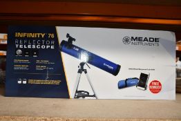 A boxed as new Meade Polaris 130 reflector telescope
