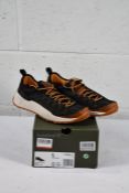 A pair of boxed as new Timberland Solar Wave EK low black mesh trainers (UK 7.5)