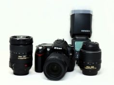 A pre-owned Nikon D90 Digital SLR Camera Body (1 x battery included) with a Sigma 18-200mm f/3.5-6.3