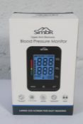 Forty boxed as new Simbr Blood Pressure monitors (Upper Arm Electronic).