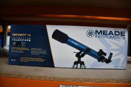 A boxed as new Meade Infinity 70 telescope