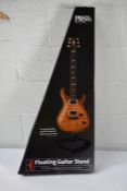 A boxed as new PRS Floating Guitar Stand.