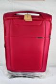 A boxed as new Samsonite D'Lite Spinner Suitcase - Fuschia (78/29 EXP).
