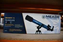 A boxed as new Meade Infinity 70 telescope