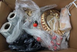 A box containing Latin American style items to include ceramics and mirrors.