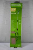 A Greenworks 24V Pole Saw Tool only (No battery or charger), split shaft