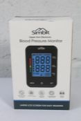 Forty boxed as new Simbr Blood Pressure monitors (Upper Arm Electronic).