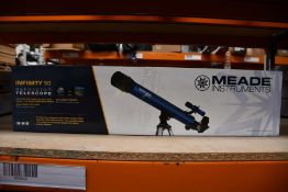 A boxed as new Meade Infinity 50 reflector telescope