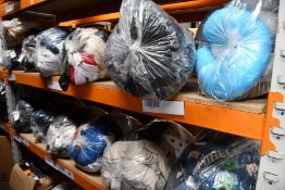 Thirteen bags of pre-owned clothing and related items.