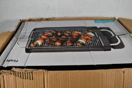 An as new Biolite FirePit+ Buring Fire Pit.