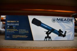 A boxed as new Meade Infinity 70 telescope