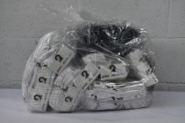 A quantity of Asics crew socks (Various sizes) (Approximately 25 packs).