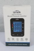 Forty boxed as new Simbr Blood Pressure monitors (Upper Arm Electronic).