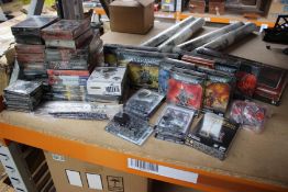 A large quantity of as new Warhammer 40,000 Miniatures, Brushes, Tape Measures, Cards and Books to i