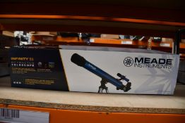 A boxed as new Meade Infinity 50 reflector telescope