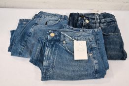 Three pairs of Ted Baker jeans to include Kickflare denim (Size 28) and barrel mid wash denim (Size