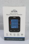 Forty boxed as new Simbr Blood Pressure monitors (Upper Arm Electronic).