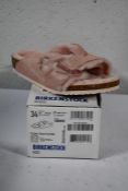 A pair of Kid's Arizona Shearling fur lined light Rose Birkenstocks (Size UK 2 (34) )