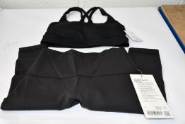 An as new Lululemon black Wunder Train HR Tight 28