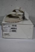 A pair of boxed as new Birkenstock 1774 Arizona off white narrow fit leather sandals (Size 39).