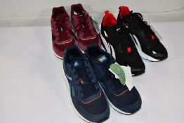 Three pairs of Reebok trainers to include Hexalite Legacy in Black/White (UK 11), Reebok GL1000 Burg