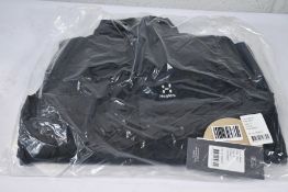 An as new Men's Haglofs Spire Mimic Vest in True Black, Size S