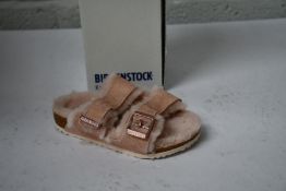 A pair of Kid's Arizona Shearling fur lined light Rose Birkenstocks (Size UK 11.5 (28) )
