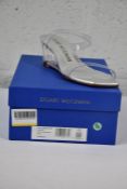 A pair of as new Stuart Weitzman Lucite Aleena 50 PVC clear mules (Size 38).