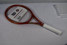 An as new Roland Garros Team 102 Tennis Racket.