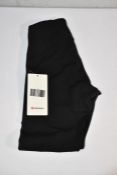 A pair of new Lululemon black Instill HR tights 25