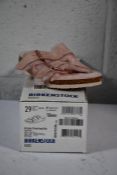 A pair of Kid's Arizona Shearling fur lined light Rose Birkenstocks (Size UK 11 (29) )