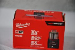 Six boxed as new Milwaukee M12B2 M12 12v 2Ah Red Lithium-Ion Batteries.