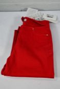 An as new Valentino Cutout High-Rise Slim-Leg Jeans, Red Denim, Size 27