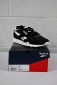 A pair of men's boxed as new Reebok Classic Nylon Running Shoes - Black (UK 8).