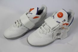 A pair of women's as new Reebok Legacy Lifter III sports shoes in white (UK 6).