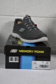 A pair of boxed Skechers slip on grey wide fit trainers (Size 13 (48.5)