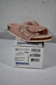 A pair of Kid's Arizona Shearling fur lined light Rose Birkenstocks (Size UK 2 (34) )