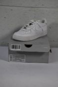 A pair of Nike Air Force 1 LE (GS) Trainers in White/White, Size UK 4, Slight marks on shoes