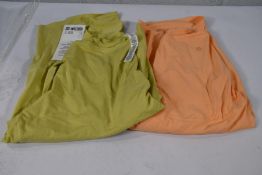 An as new Lululemon Back in Action Fiye short sleeve top (Size 6) and a Lululemon Back in Action sho