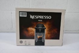 A Nespresso Pixie Coffee Machine C61 ME