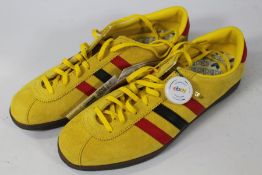A pair of Adidas Herzogenaurach (UK 9.5, as new but have some dirty marks, no box).