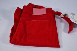 An as new Valentino Cutout High-Rise Slim-Leg Jeans, Red Denim, Size 28