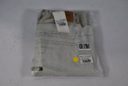 A pair of American Vintage Big Carrot super bleached five pocket Joybird jeans (Size EU 38)