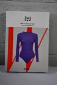 A boxed as new Wolford - Dots Illusion net Body - Playful Dotted Bodysuit - Ultra Violet (L).